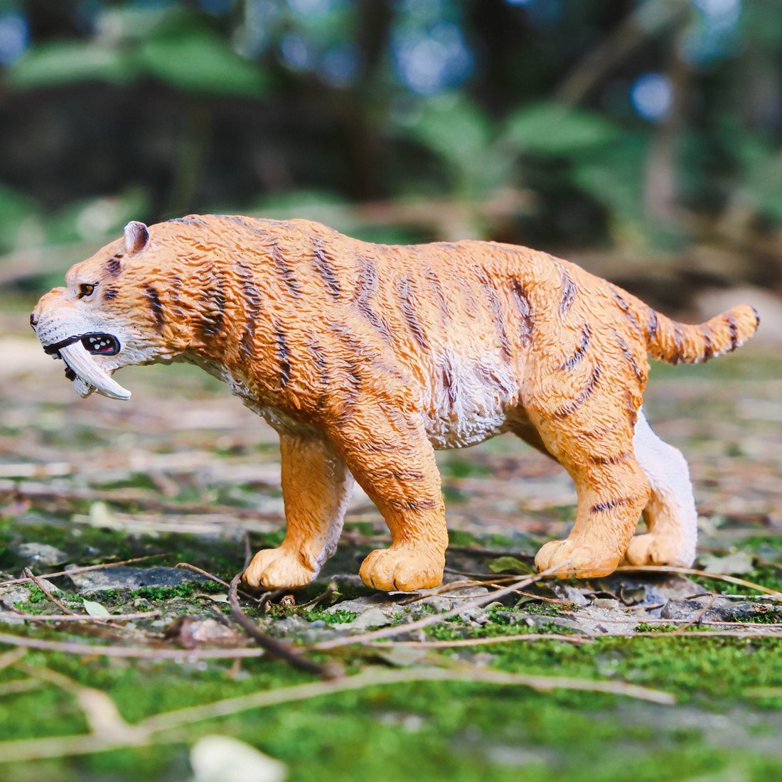 Walking Smilodon Figure, displayed in a natural scene