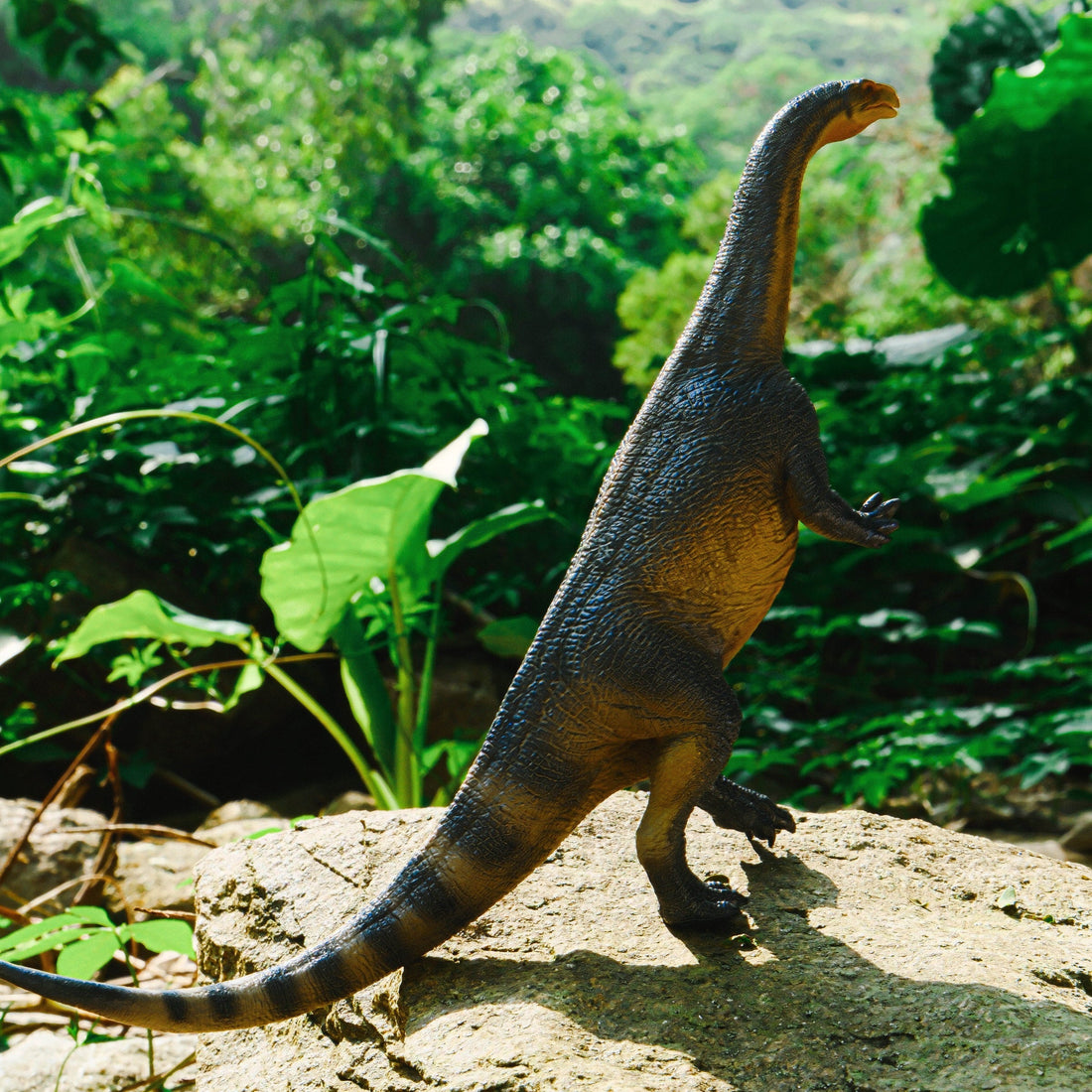 Lufengosaurus Figure, displayed in a natural scene