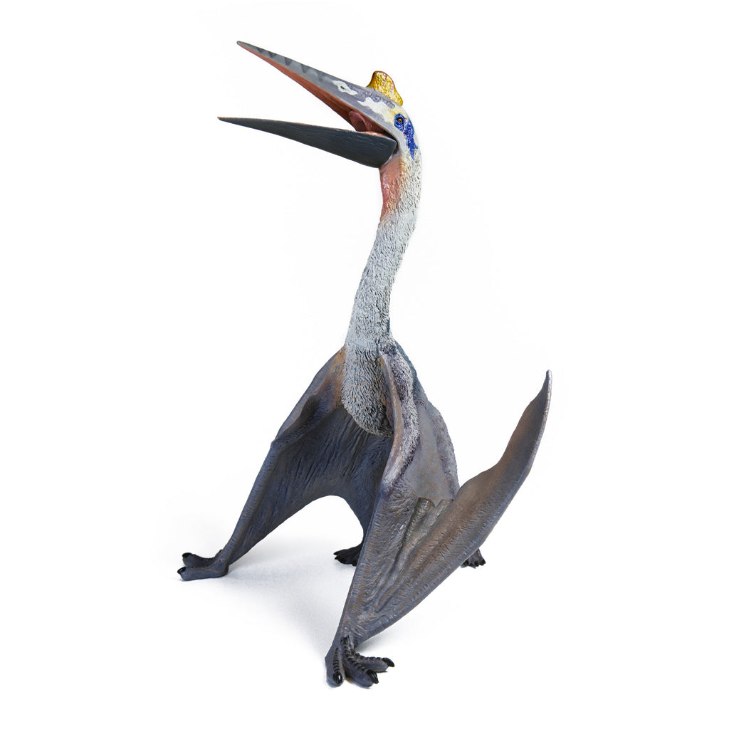 Blue Quetzalcoatlus figure standing with folded wings and an open beak on a white background, primary view