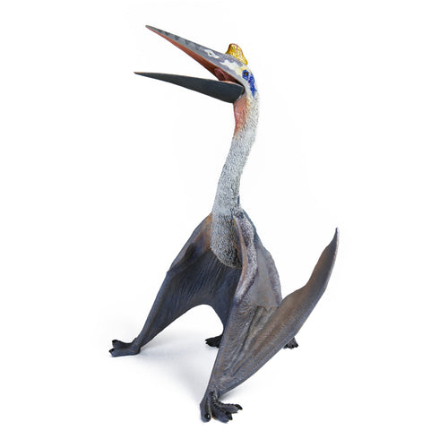 Blue Quetzalcoatlus figure standing with folded wings and an open beak on a white background, primary view